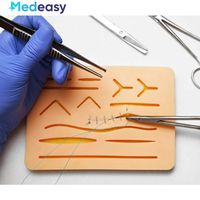 Kit de pratique de suture chirurgicale pour l'entraînement à la suture, coussin de suture en silicone avec plaies pré-coupées et kit d'outils