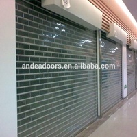 Portes d'entrée enroulables transparentes en polycarbonate de sécurité YIWU