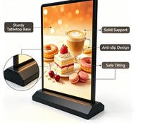 Boîtes lumineuses publicitaires LED pour comptoirs commerciaux avec cadre noir et base robuste pour l'affichage des menus de restaurants et cafés