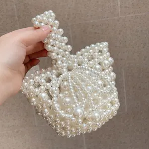 New children's Korean version of solid color pearl handbag little girl fashion purse go out accessories bag wholesale