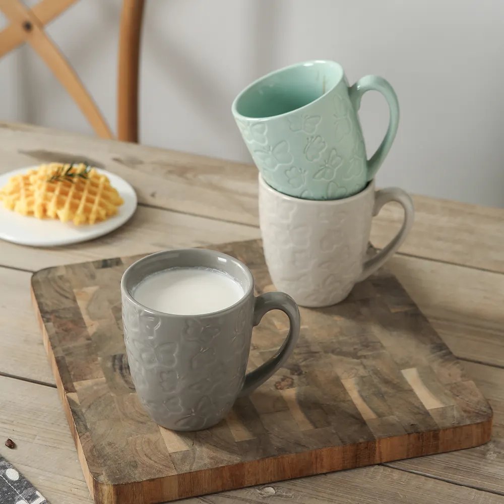 Sanayi iyi fiyat Nordic renkli seramik kahve kupa özelleştirmek kabarcık çay fincanları kabartmalı porselen kupalar