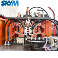 Chine nouvelle conception entièrement automatique eau minérale rotatif PET bouteille en plastique soufflage Machine de moulage par soufflage à grande vitesse