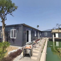 Maison préfabriquée minimaliste Xinheng de 20 pieds en conteneur plat avec panneaux sandwich en acier, design respirant, installation facile