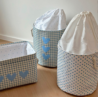 Panier de rangement pliable en toile à motif lapin avec poignée en corde, idéal pour vêtements, jouets ou linge sale