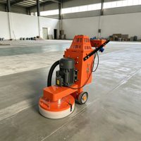 Meuleuse à béton époxy manuelle, machine à meuler le ciment diamantée pour la rénovation des sols d'entrepôts et de garages