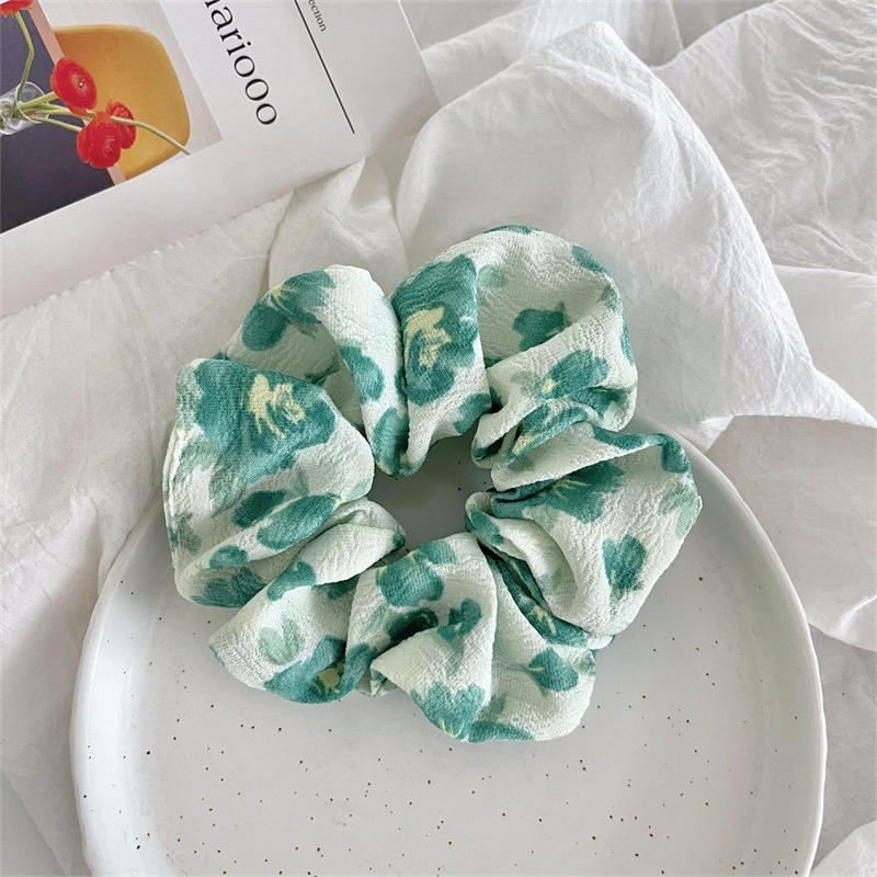 4 green floral hair ties