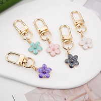 Ventes chaudes 2024 - Porte-clés personnalisés en métal émaillé avec fleur de cerisier pour femmes et filles