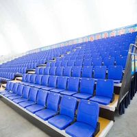 Sièges de tribune connectés au stade avec coque en plastique durable et cadre métallique pour les arènes de football et de basketball