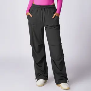 Venta al por mayor ocio deportes mujeres cintura alta primavera ajustable cordón bolsillo lateral suelto jogging yoga Pantalones