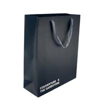Individuell Bedruckte Luxus-Versandtasche aus Biologisch Abbaubarem Umweltfreundlichem Kunstpapier mit Langlebigem Baumwollseilgriff-Design für Kleidung