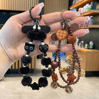 Chaîne de téléphone en matériaux mixtes avec pompon moelleux, perles acryliques et breloque en silicone, lanière porte-clés personnalisée OEM