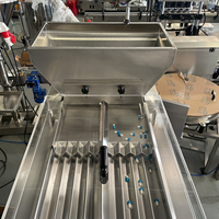 Nouvelle conception de machine de remplissage de comprimés et de bonbons en plastique pour l'emballage alimentaire et des boissons, pneumatique, haute précision