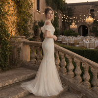 Robe de cocktail sirène ivoire à col montant, en tulle perlé, manches bouffantes, broderie vigne, sequins, longueur ras du sol avec traîne, sur mesure, vente en gros
