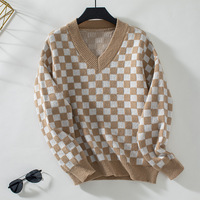 Maglione con motivo a scacchiera invernale all'ingrosso con scollo a V a tracolla manica lunga Pullover larghi a coste in maglia a quadri maglioni da donna