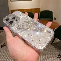 Coque de téléphone papillon ajourée en strass de luxe léger, motif exquis, compatible avec iPhone 17 16 15 14 13 12