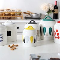 Conteneur de cuisine avec logo personnalisé Pot de stockage Pot de miel en céramique blanche Motif personnalisé pour la décoration intérieure