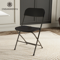 Chaise pliante portable en plastique blanc et noir pour événements extérieurs, idéale pour mariages et réceptions – Vente en gros directe usine