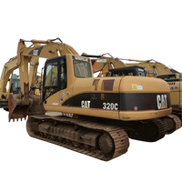 Excavatrice Caterpillar Cat 320C d'occasion avec peinture d'origine, prix abordable, pour travaux routiers