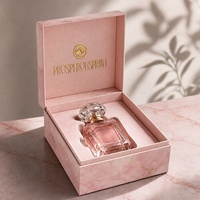 Boîte magnétique en carton rigide personnalisée pour emballage de parfum 35 ml, texture marbre, logo en feuille d'or avec insert en éponge