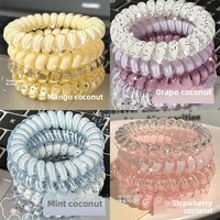 Élastique à cheveux polyvalent en résine plastique de haute qualité, style coréen, à pois raisin et noix de coco, haute élasticité, avec anneau de téléphone intégré