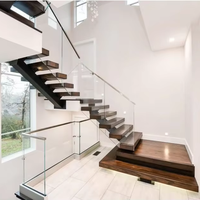 Escalier droit moderne haut de gamme avec marches en bois massif et poutres en acier pour projets résidentiels