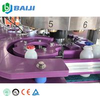 Ligne de production entièrement automatique de machine de cachetage de feuille d'aluminium de remplissage de boisson de lait de litchi de jus de bouteille de HDPE