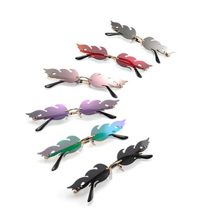Gafas de sol Flame para mujer, montura metálica sin marco, protección UV400, gafas de fiesta a la moda, lentes de PC TR Metals, color azul - Product Image 1