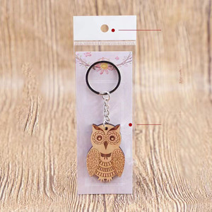 Vente en gros de cadeaux créatifs DIY, pendentif en bois gravé au laser, porte-clés en forme d'animal, porte-clés en bois DIY - Product Image 5