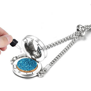 Bracelet magnétique ajustable en acier inoxydable, design créatif ajouré, pour aromathérapie et huiles essentielles, tendance pour femme - Product Image 5