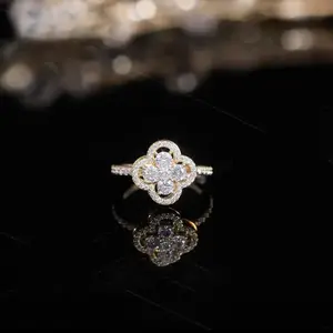 Korean style micro-inlaid four-leaf clover zircon flower rotatable food ring light luxury niche opening adjustable women's ring