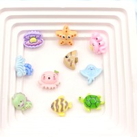 100 pièces en gros bricolage dessin animé mer animaux coquille étoile de mer Flatback Mini mignon résine poisson tortue Octpus décoration charme artisanat