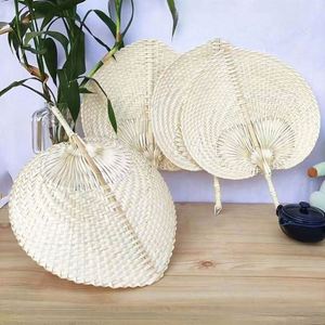Éventail artisanal en bambou naturel écologique et feuille de palmier, disponible en plusieurs couleurs, idéal pour offrir en cadeau - Vente en gros - Product Image 1
