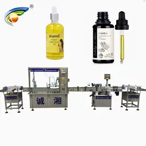 CHENGXIANG machine de remplissage automatique de bouteilles compte-gouttes d'huile d'argan capsuleuse à 2 têtes d'huile de chanvre