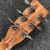 Guitare acoustique en bois massif personnalisée avec dessus en épicéa massif, dos et côtés en palissandre, bordure complète en nacre, logo personnalisé sur la tête