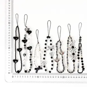 Explosive INS wind black pearl mobile phone lanyard manufacturers wholesale mobile phone anti-drop mobile phone hanging jewelry