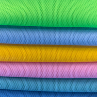Tissu en maille à œillets 100% polyester, couleur unie, teinture unie, coupe ajustée, 140 GSM, pour maillot de basket-ball, polo