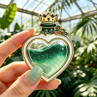 En gros : Pins en émail en métal à paillettes liquides, motif bouteille de potion magique en forme de cœur, badges artisanaux personnalisés, pins de revers Quicksand