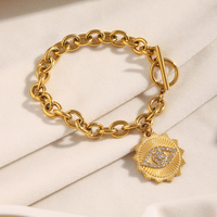 Bracelet Dreamidea en acier inoxydable plaqué or 18 carats avec breloque œil et fermoir à bascule – Bijou tendance et protecteur