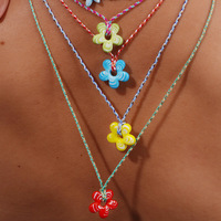 Verano 2025 Muti-Color cristal rojo flor collar único cuerda bloqueo flor suéter estilo Margarita flor gargantilla encanto collar