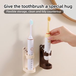 Bear Shaped <b>Wall</b> <b>Mounted</b> <b>Electric</b> <b>Toothbrush</b> <b>Holder</b> Cord Organizer Self Adhesive <b>Electric</b> <b>Toothbrush</b> Stand for Bathroom - Product Image 1