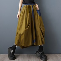 Jupe ballon décontractée plissée asymétrique taille élastique en jean olive patchwork couleur contrastante pour femme, collection été 2026, vente en gros