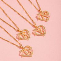 Collier léger de luxe à motif floral et lettre en forme de cœur pour femme, chaîne de clavicule unique et élégante