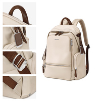 Sac à dos imperméable pour femme avec protection RFID, capacité moyenne, design ergonomique pour les voyages d'affaires et l'usage quotidien