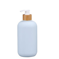 Juego de plástico cosmético HDPE con tapa abatible verde, limpiador Facial, botella vacía, bomba de loción de ducha, botella 200/260/300/400/500ml