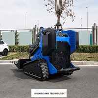 Mini-chargeuse compacte sur chenilles 5,1 kN avec système hydraulique 16 MPa, capacité de montée de 25 degrés, charge utile de 1291 kg