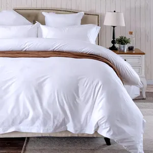 Premium custom logo hotel biancheria da letto copripiumino lenzuolo bianco set biancheria da letto per hotel 100% cotone