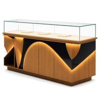 Vitrine d'exposition de bijoux LED haut de gamme en gros, vitrine en bois, métal et verre sur mesure pour salle d'exposition et bijouterie