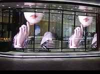 Panneau lumineux commercial programmable à écran d'affichage transparent intelligent LED d'extérieur durable pour façade publicitaire géant