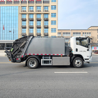 Camion compacteur de déchets électrique pur 4x2 Shacman EV Chassis 7m³ à chargement arrière pour la collecte des ordures et des déchets à vendre