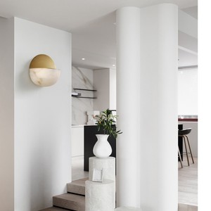 Circular brass <b>LED</b> wall lamp with white plaster finish and warm white <b>light</b>—suitable for indoor living <b>rooms</b> bedrooms and home - Product Image 3